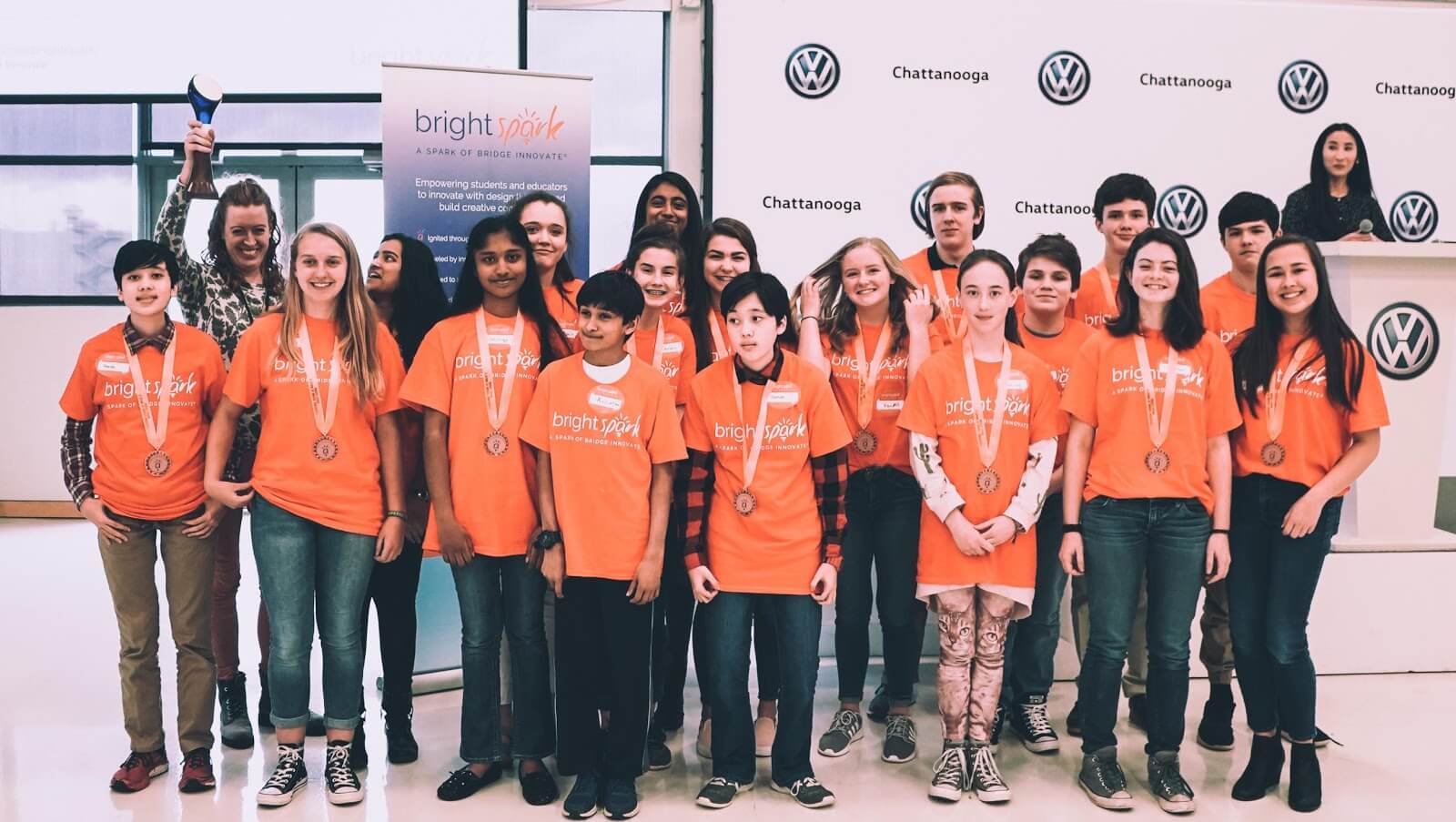 Students in orange Bright Spark T-shirts at the Student Design Awards in Chattanooga